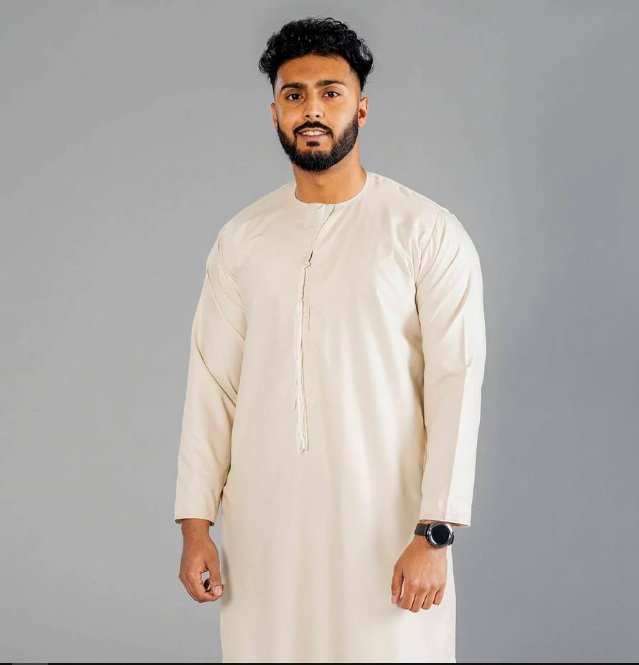 Add some colours to your wardrobe with Simple peach Emirati jubbah